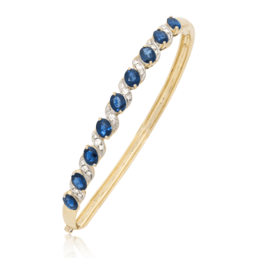 4cts of Blue Sapphire in a 9ct Gold & Diamond Bangle