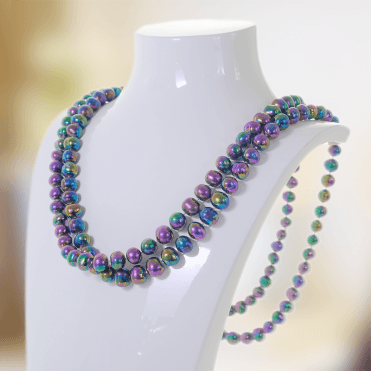 Proud 50" Continuum of Peacock Pearls for Only £95